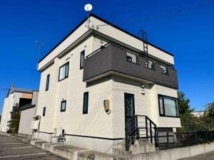 五所川原市　S様邸　外壁金属サイディングカバー工事、屋根塗装工事